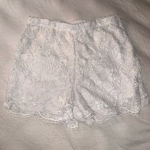 white crochet flower shorts